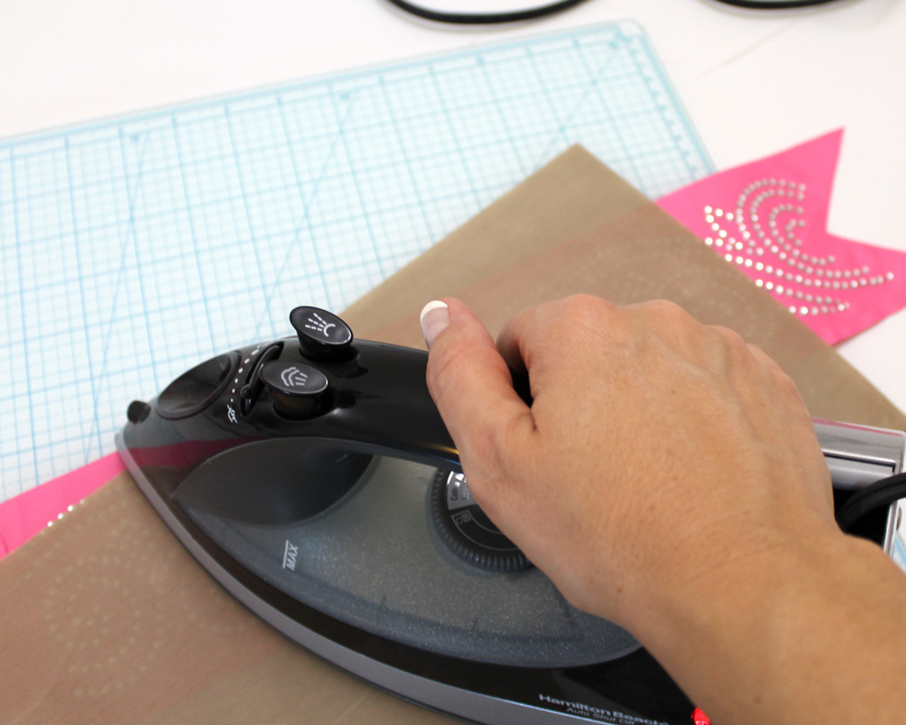 apply more heat with iron or heat press